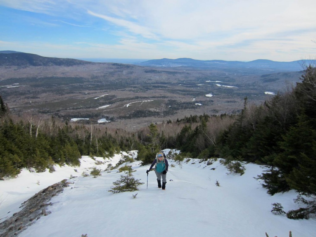 A hiker climbs Baker Mountain. (Photo courtesy of AMC)